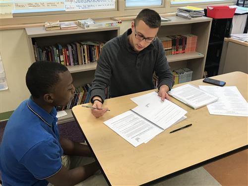 Mentor Matt Vana, accounts payable manager at Medical Mutual, helps a student narrow his preferences in choosing a CMSD high  