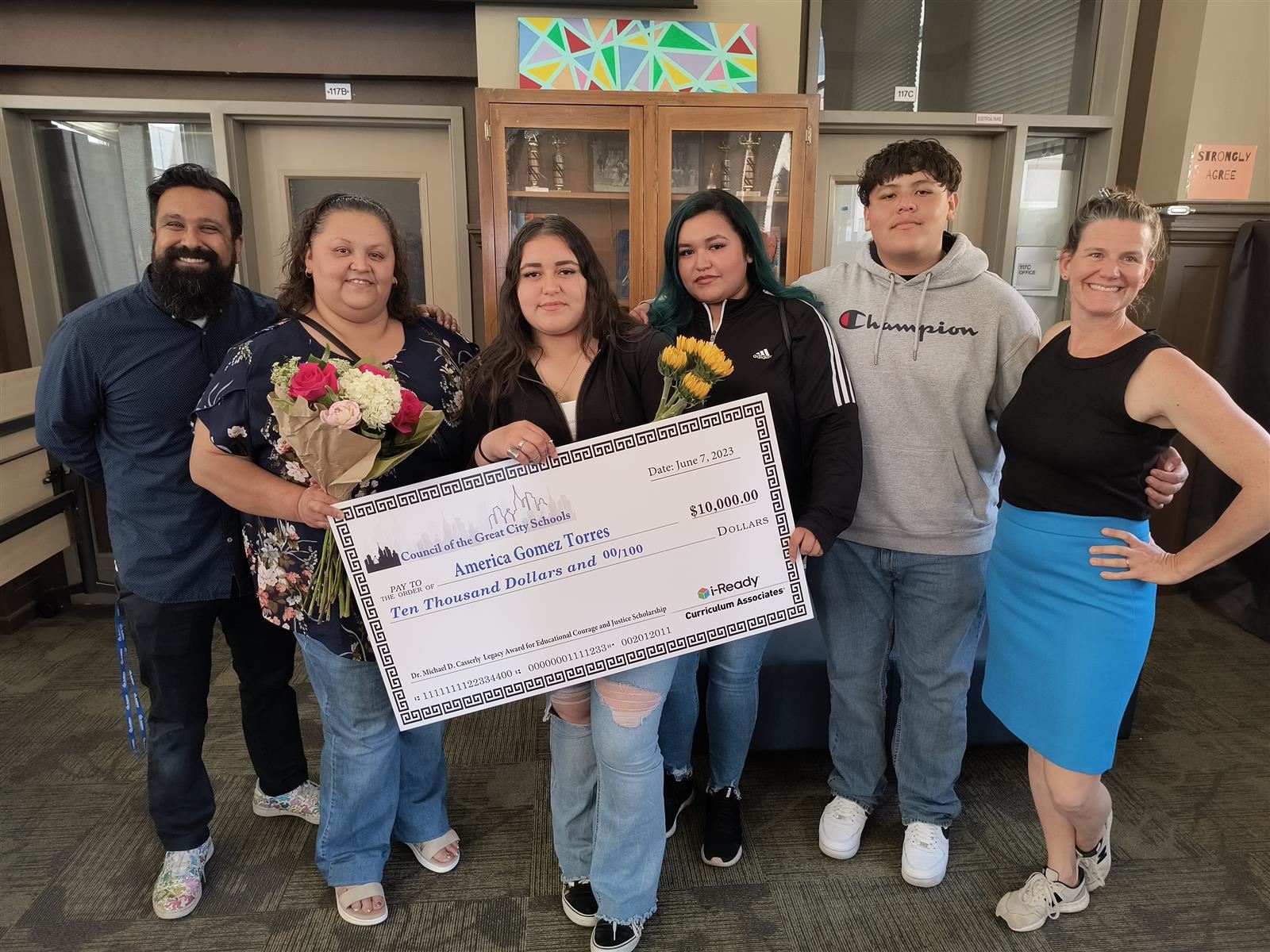  Student holds scholarship check