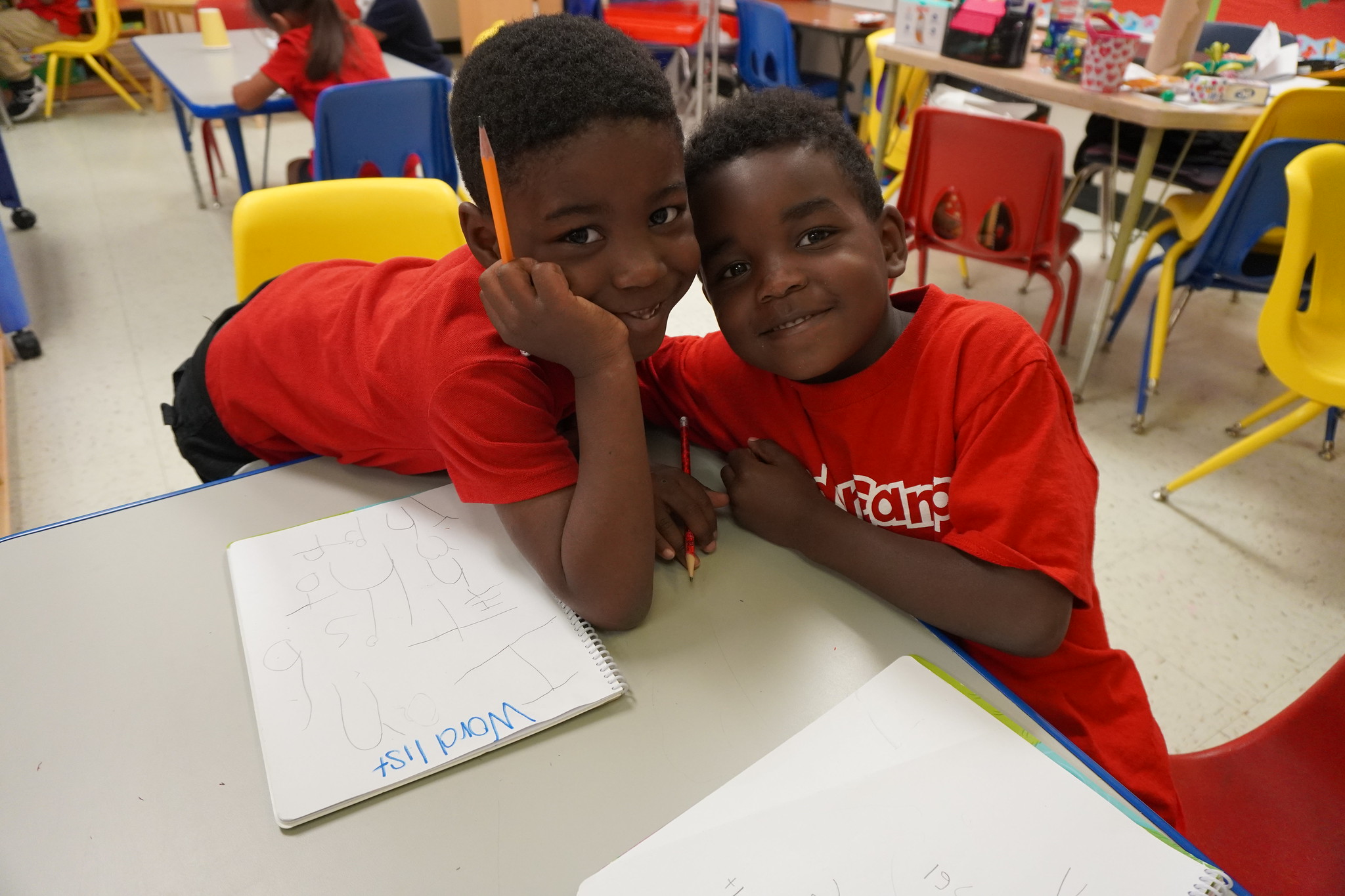  2 students in class at their desks